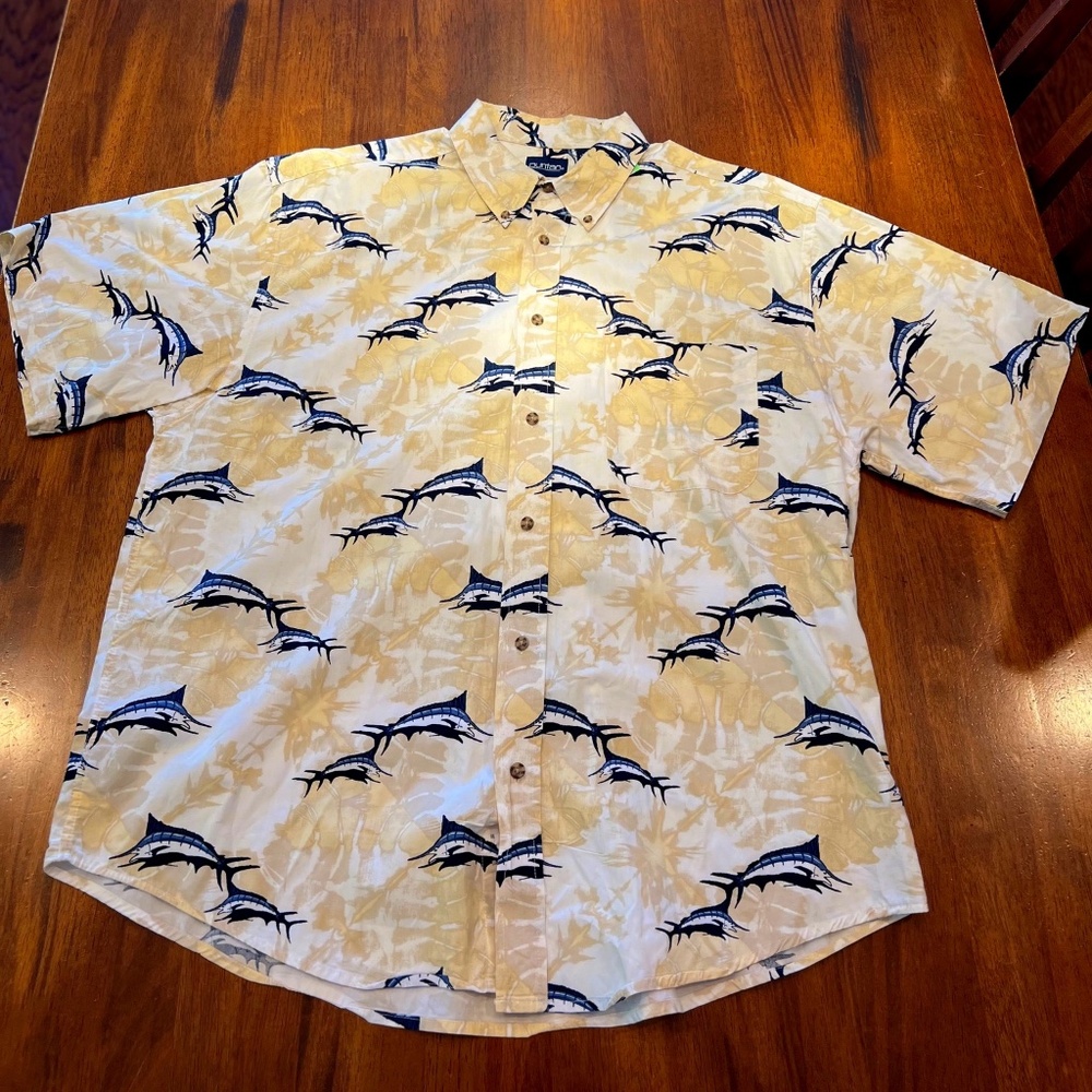A XL mens Puritan brand shirt that is tan with a sword fish pattern.